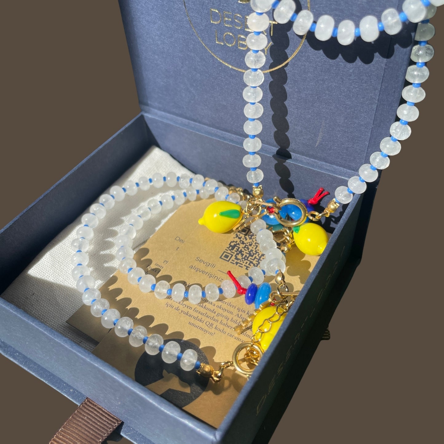 Fishbone | Quartz Anklet with Steel Fishbone and Murano Glass Lemon Charm