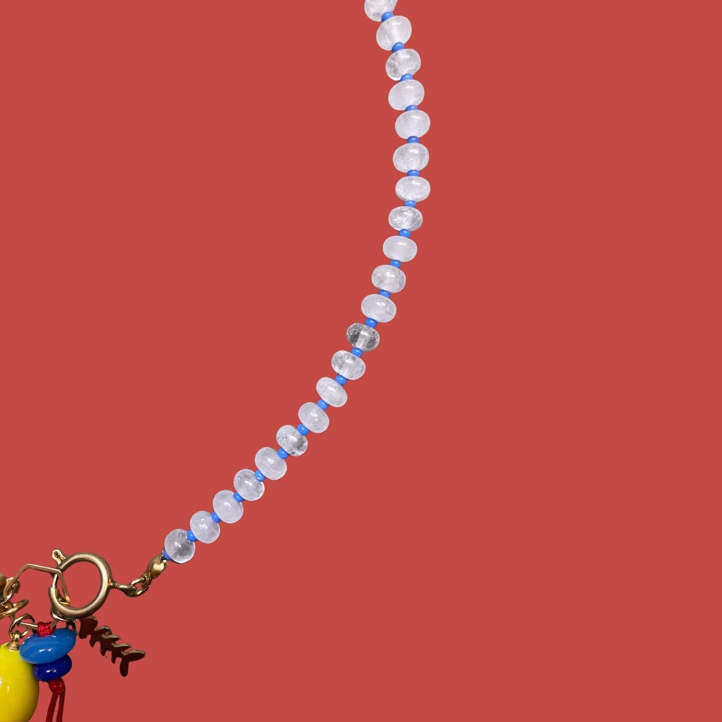 Fishbone | Quartz Necklace with Steel Fishbone and Murano Glass Lemon Charm